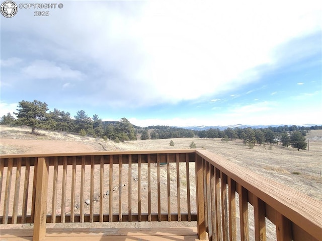 deck featuring a rural view