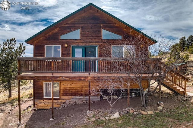 180 E Cobb Ln, Guffey, CO 80820 - back of house featuring stairway and a wooden deck