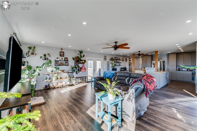 living room featuring dark hardwood / wood-style flooring and french doors