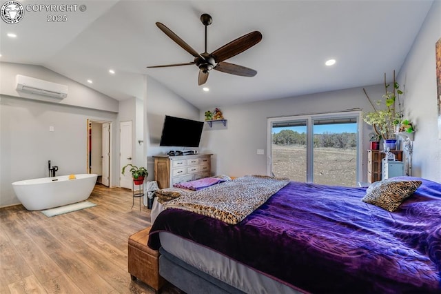 bedroom with vaulted ceiling, a wall unit AC, access to exterior, ceiling fan, and light wood-type flooring