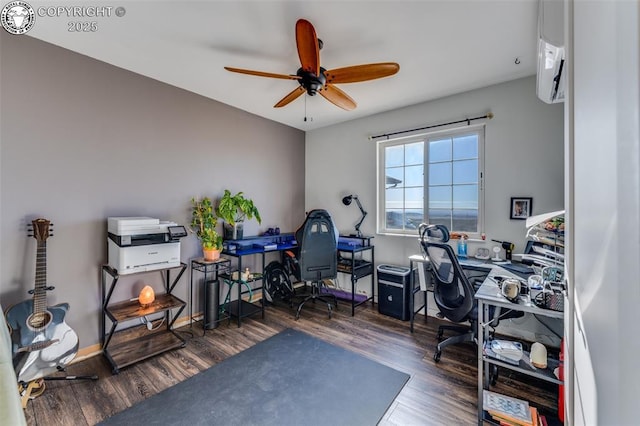 office featuring dark wood-type flooring and ceiling fan