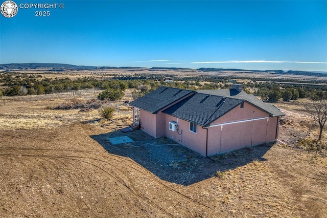 drone / aerial view with a mountain view