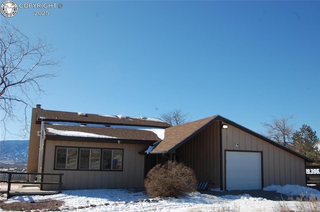 exterior space with a garage