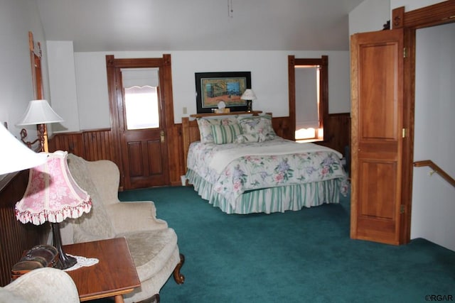 bedroom featuring dark carpet