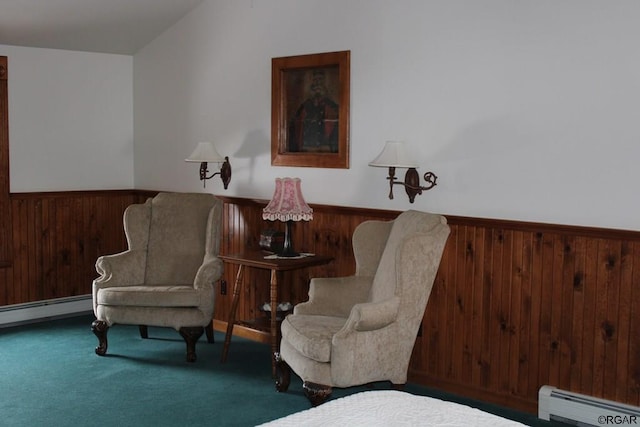 sitting room featuring carpet floors and baseboard heating