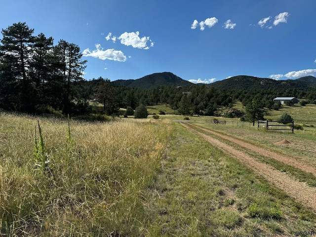 view of mountain feature with a rural view