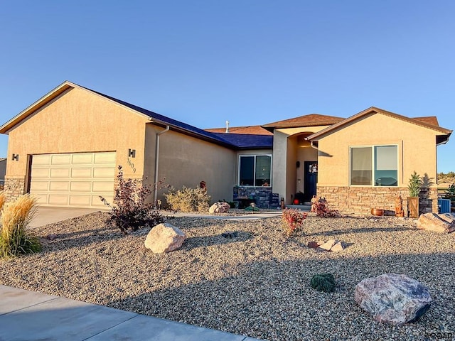 view of front of home with a garage