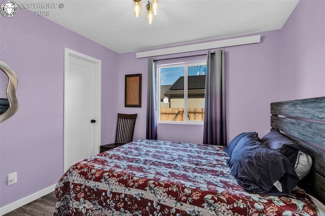 202 First St, Silver Cliff, CO 81252 - bedroom featuring wood finished floors and baseboards