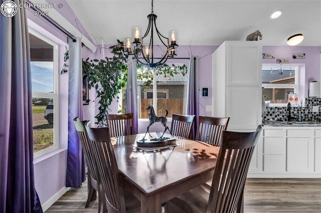 202 First St, Silver Cliff, CO 81252 - dining room featuring a chandelier, wood finished floors, and recessed lighting