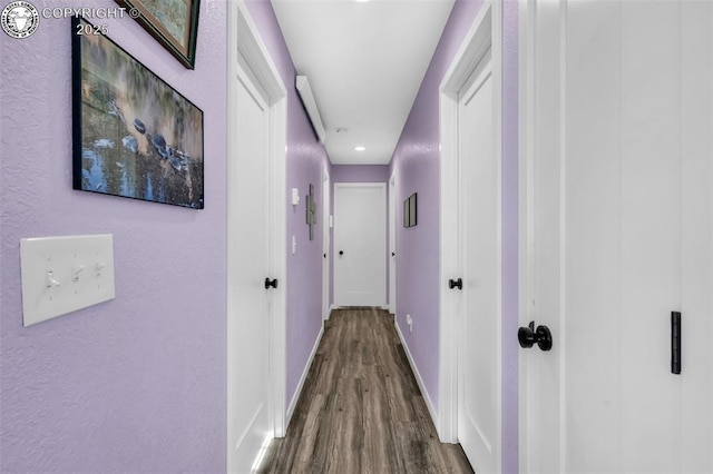 202 First St, Silver Cliff, CO 81252 - corridor with dark wood-type flooring and recessed lighting