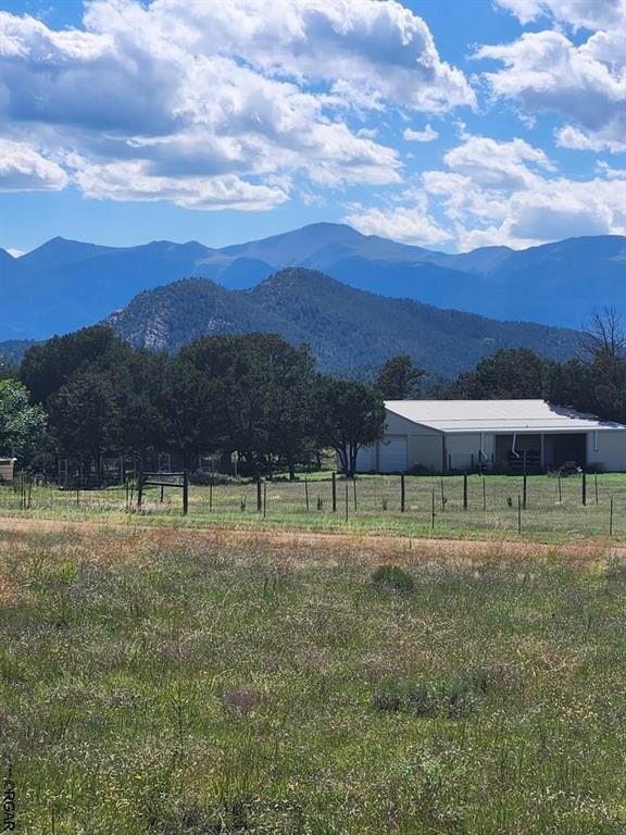 view of mountain feature featuring a rural view