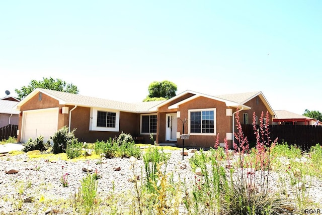 101 Rocchio Dr, Florence, CO 81226 - ranch-style home with a garage