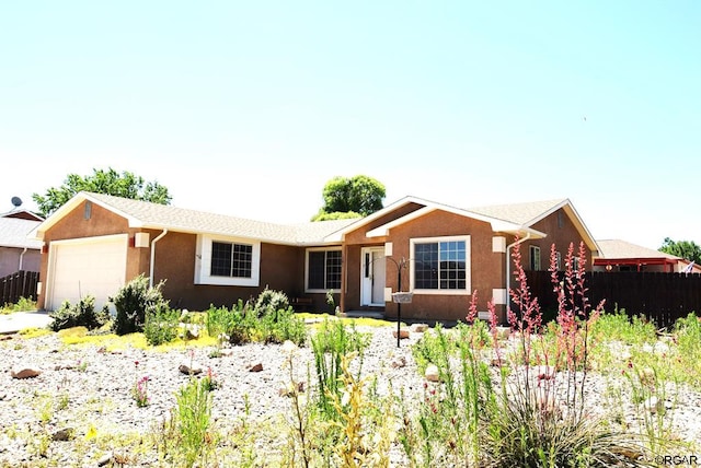 ranch-style home with a garage