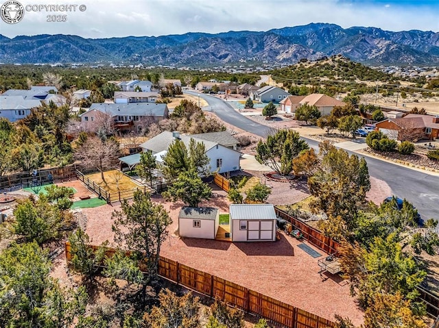 bird's eye view featuring a mountain view and a residential view