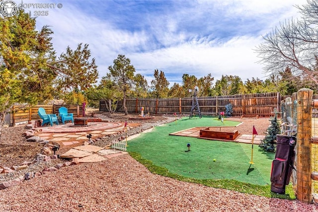 surrounding community featuring a patio area, an outdoor fire pit, and a fenced backyard