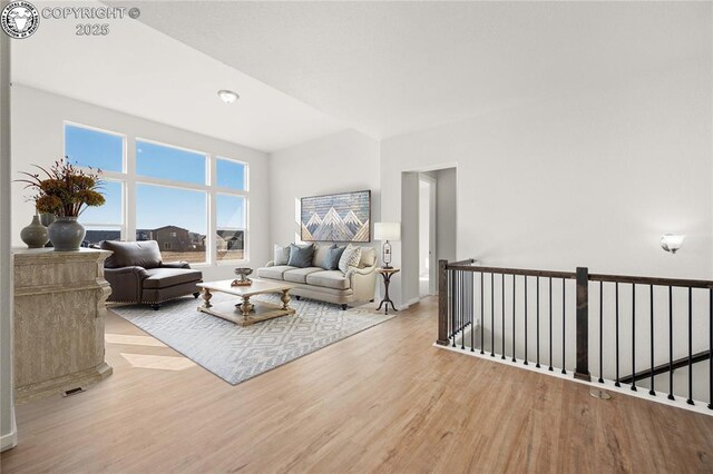 empty room with carpet, visible vents, and baseboards