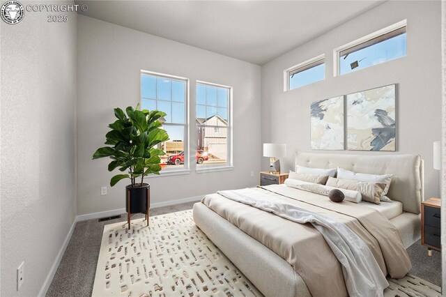 unfurnished bedroom featuring a closet, carpet, and baseboards