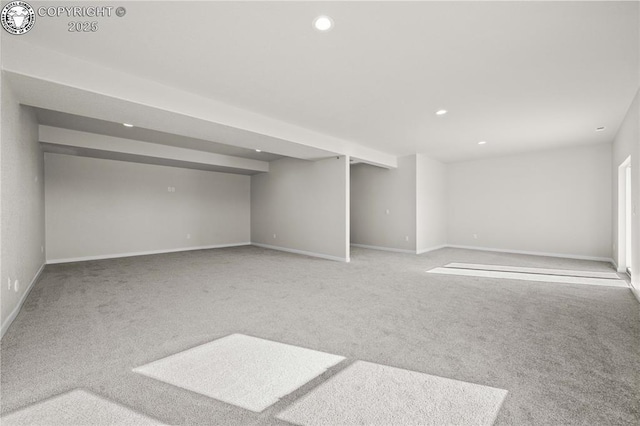 finished basement with carpet, baseboards, and recessed lighting