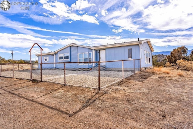 manufactured / mobile home featuring fence private yard