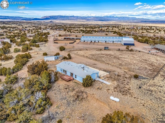 aerial view with view of desert and a mountain view