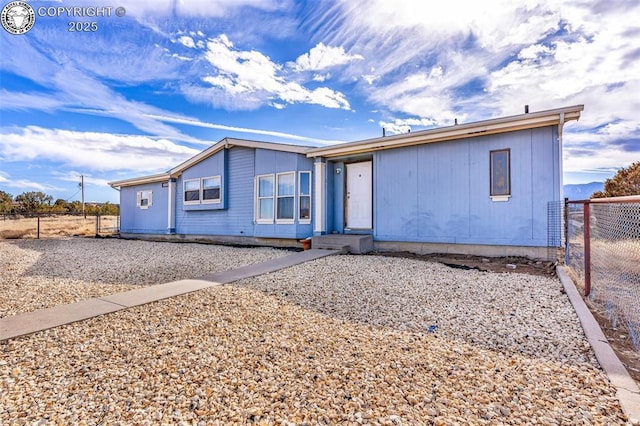 view of front of property with fence