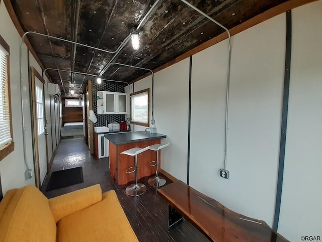 kitchen with backsplash and a center island