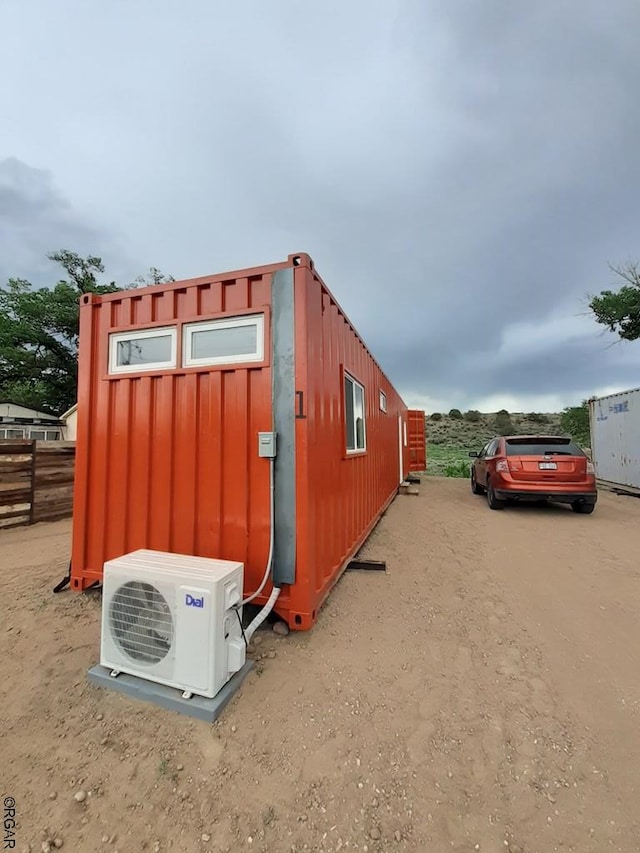 view of outdoor structure with ac unit