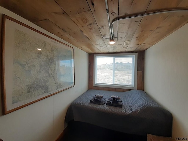 bedroom with wooden ceiling