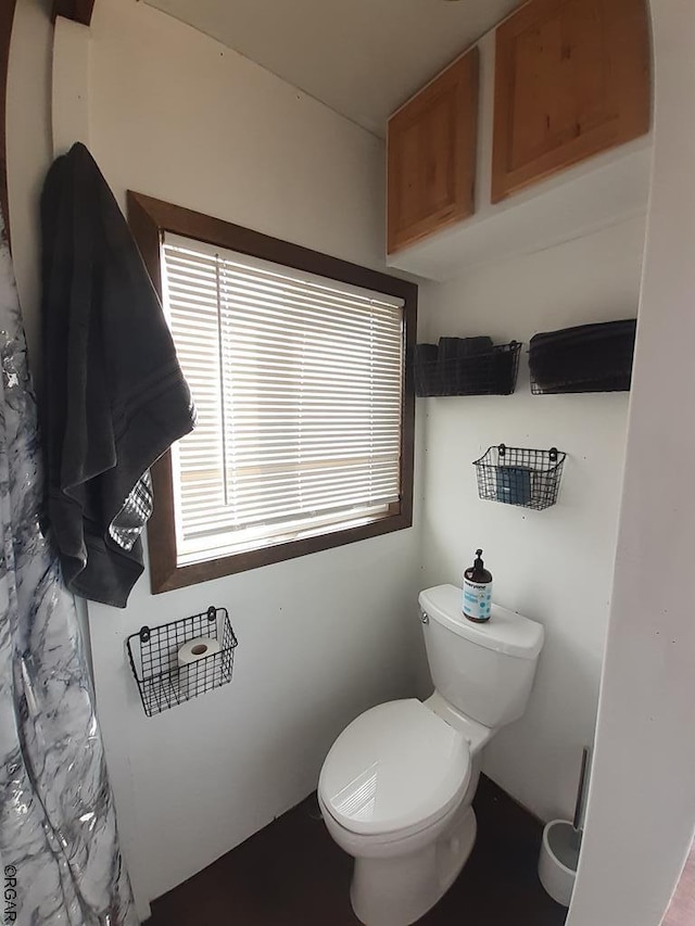 bathroom featuring toilet