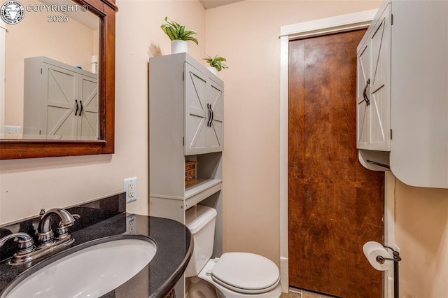 bathroom with sink and toilet