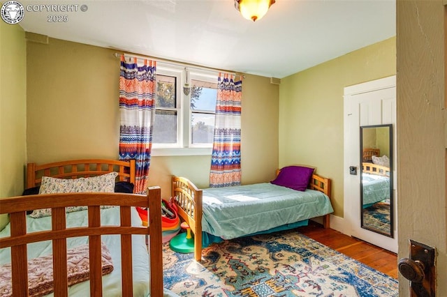 bedroom featuring hardwood / wood-style floors