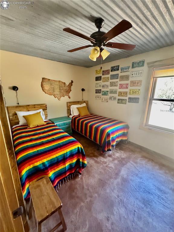 214 Durfee Cir, Westcliffe, CO 81252 - carpeted bedroom featuring a ceiling fan