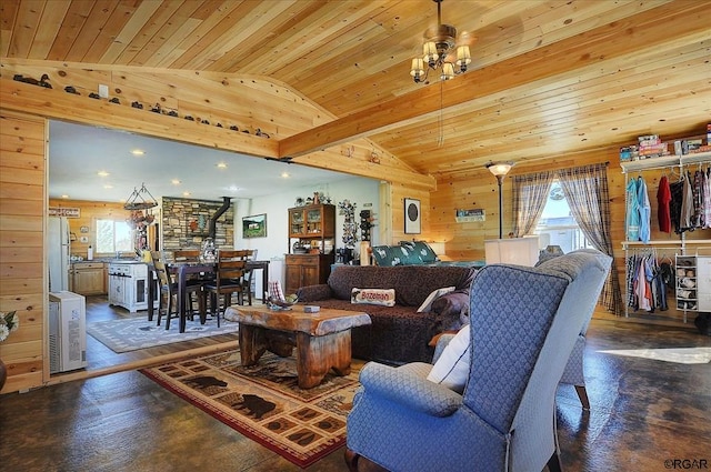 living room featuring lofted ceiling, wood ceiling, and wooden walls