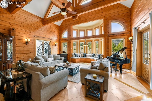 324 Elk View Ct, Canon City, CO 81212 - living room featuring wooden walls, ceiling fan, and lofted ceiling with beams