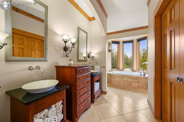 324 Elk View Ct, Canon City, CO 81212 - bathroom featuring a sink, tile patterned floors, two vanities, and a garden tub