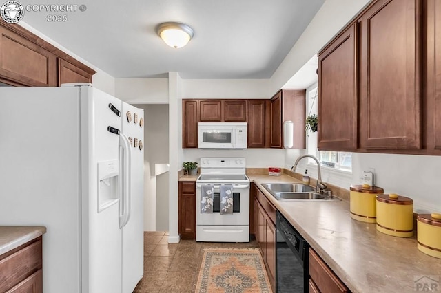 kitchen featuring sink and white appliances