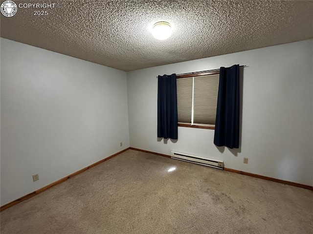 9 Granada Ct Unit 5, Westcliffe, CO 81252 - carpeted spare room with a baseboard radiator, a textured ceiling, and baseboards
