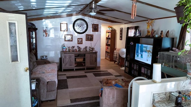 living room with vaulted ceiling with beams and ceiling fan