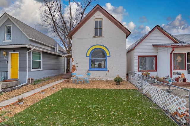 521 Main St, Florence, CO 81226 - view of front facade featuring a front lawn