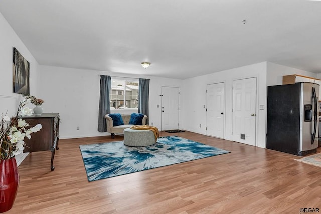 sitting room with light hardwood / wood-style floors