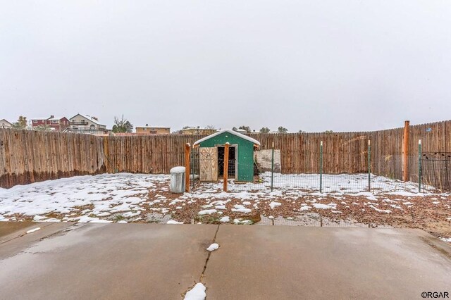 view of yard covered in snow