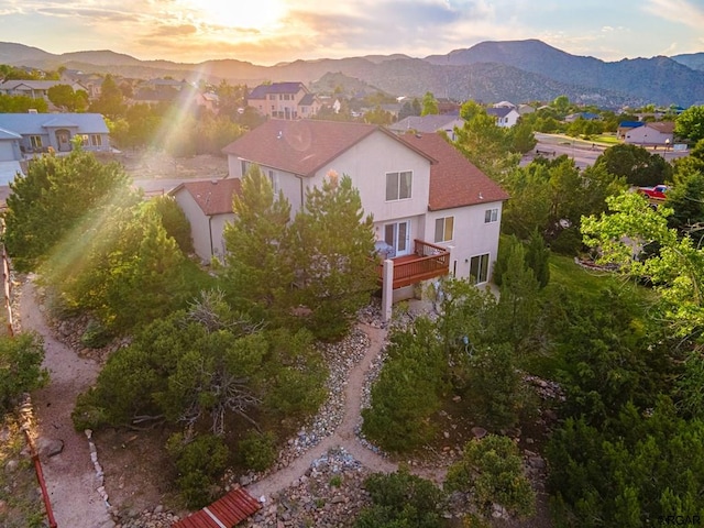 aerial view at dusk with a mountain view