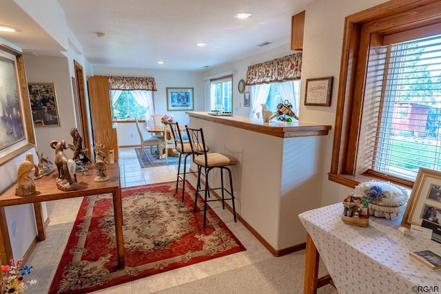 kitchen with a kitchen breakfast bar