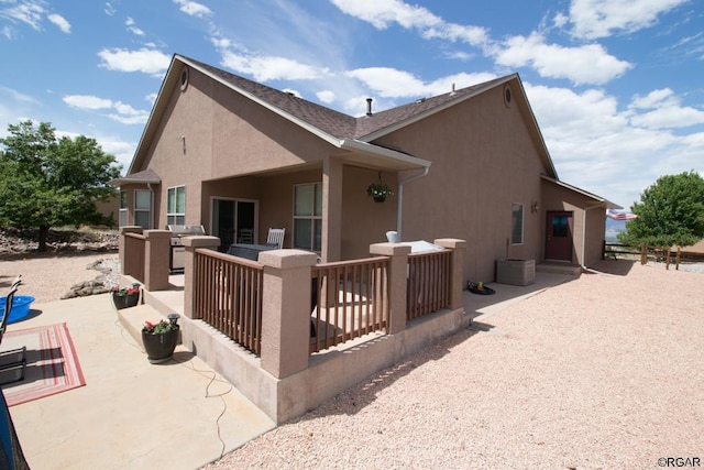 rear view of house featuring a patio area