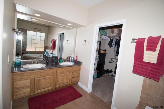 bathroom featuring vanity and tile patterned flooring