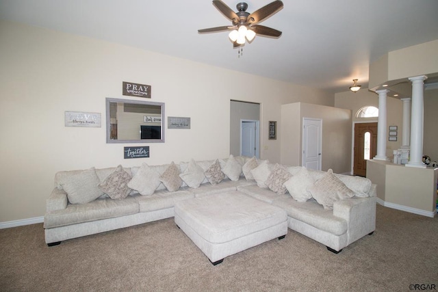 living room featuring ceiling fan, carpet, and ornate columns