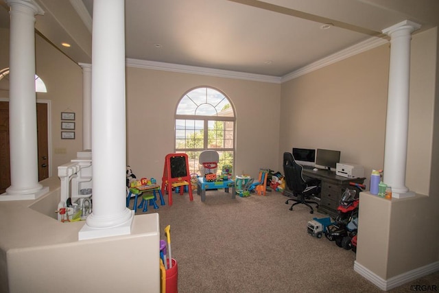 rec room with ornate columns, ornamental molding, and carpet