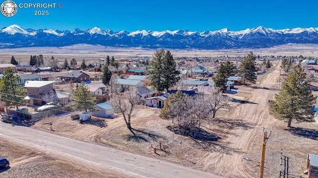 drone / aerial view featuring a mountain view