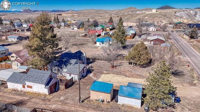 bird's eye view with a mountain view