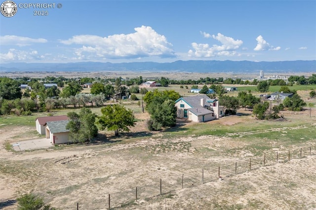 bird's eye view with a rural view and a mountain view